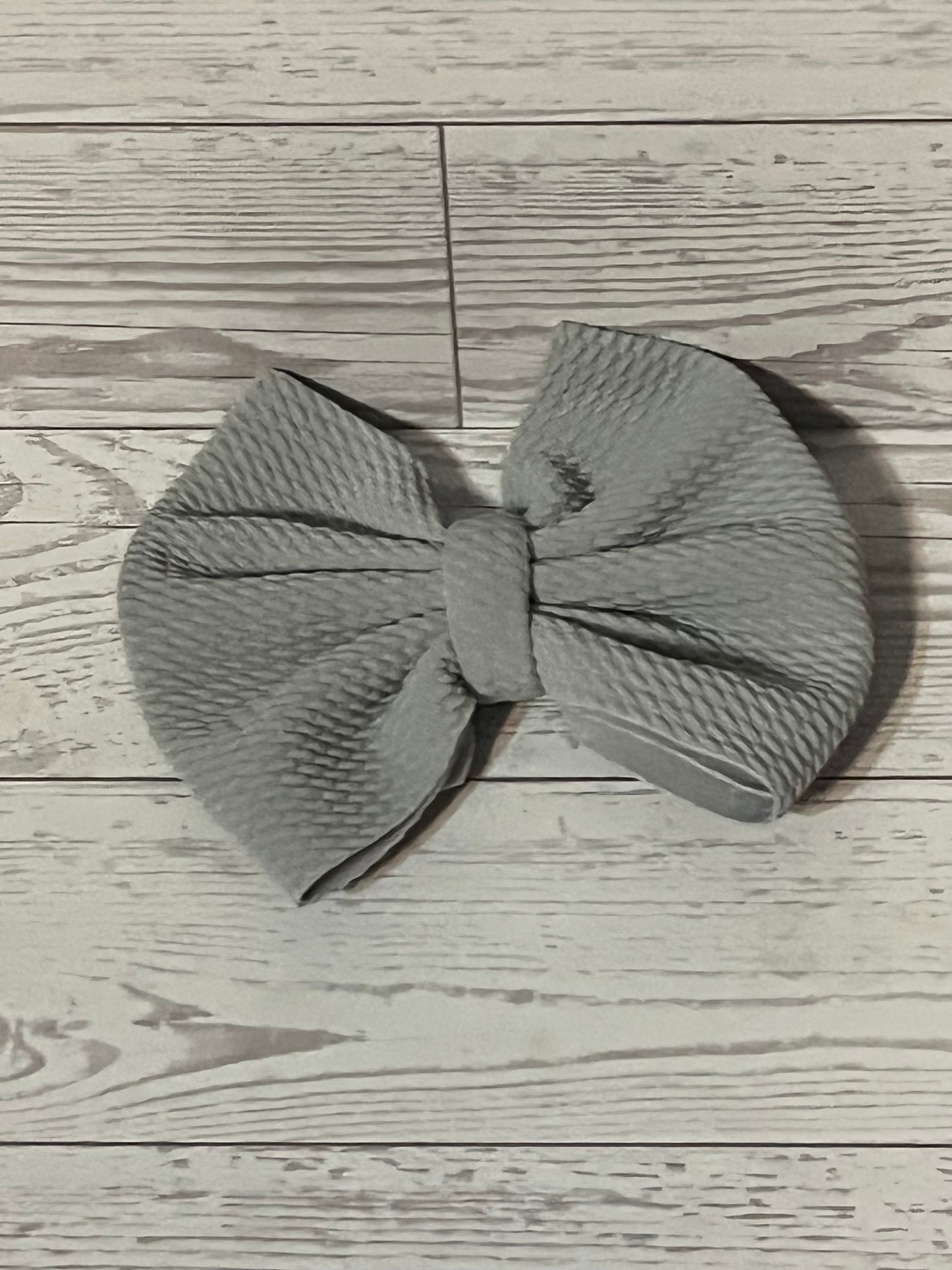 Grey bow/hair tie