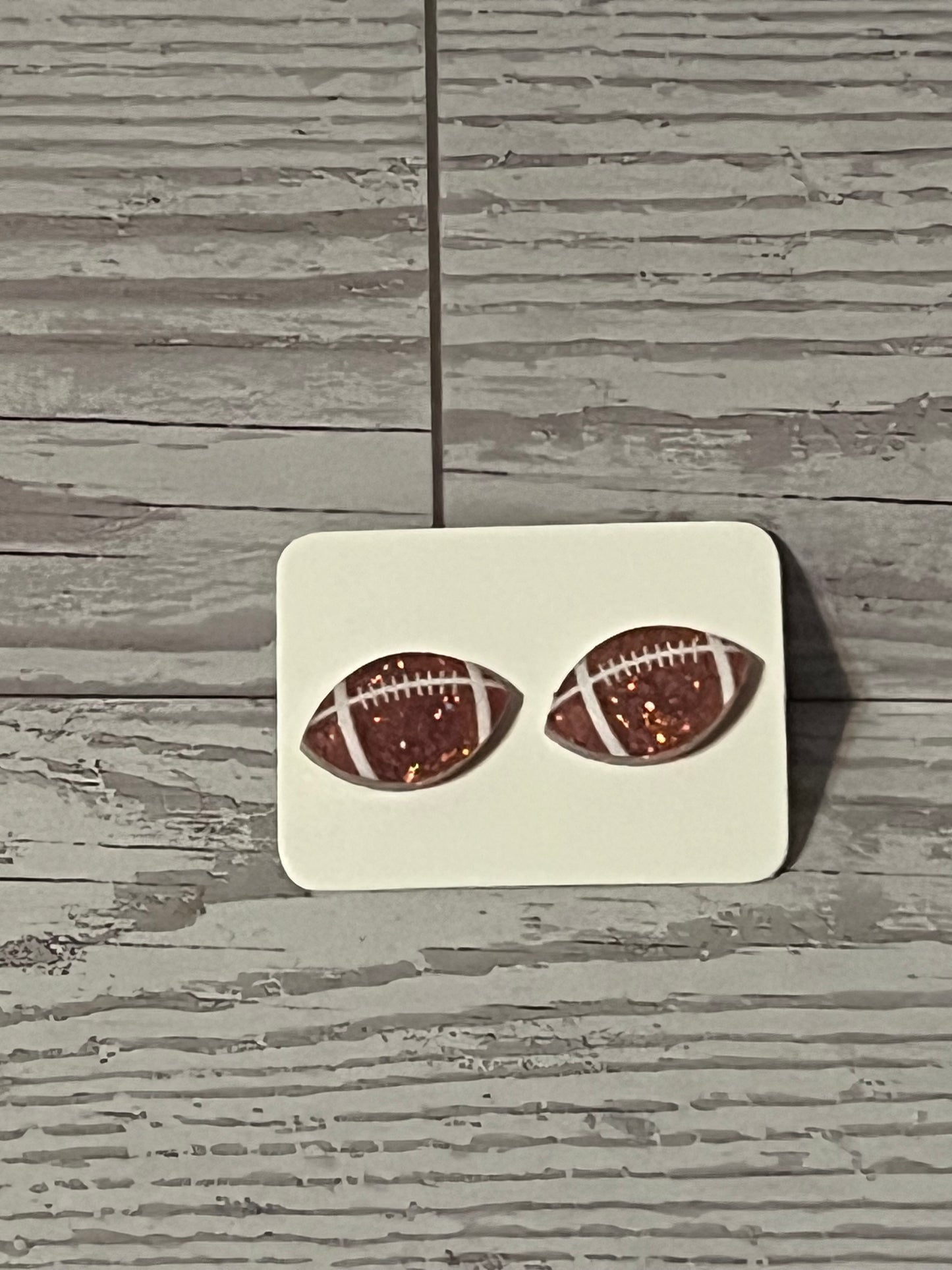 football earrings